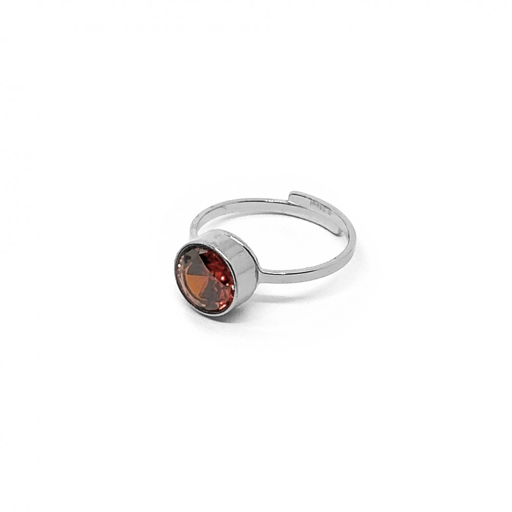 Μονόπετρο δαχτυλίδι με κόκκινο στρογγυλό zircon σε ασημί χρώμα από Ανοξείδωτο Ατσάλι